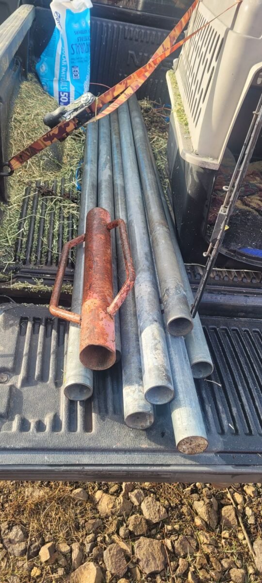 Fence pounder and posts to build a wildlife guzzler.